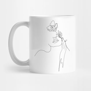 One line drawing of a woman holding a flower Mug